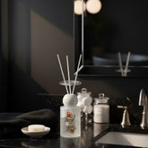 High Objects elegant frosted glass reed diffuser with floral artwork and jasmine scent, 110 ML.