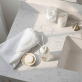 High Objects frosted glass reed diffuser with floral artwork and white reeds, 110 ML, Rich Jasmine scent.