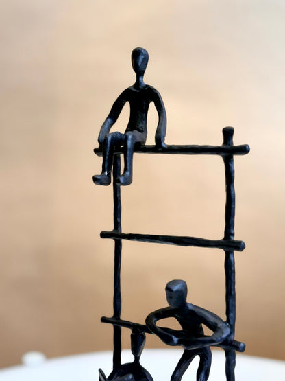 High Objects Journey Ladder Artefact figurine, abstract figures climbing ladder, matte black iron, modern decor