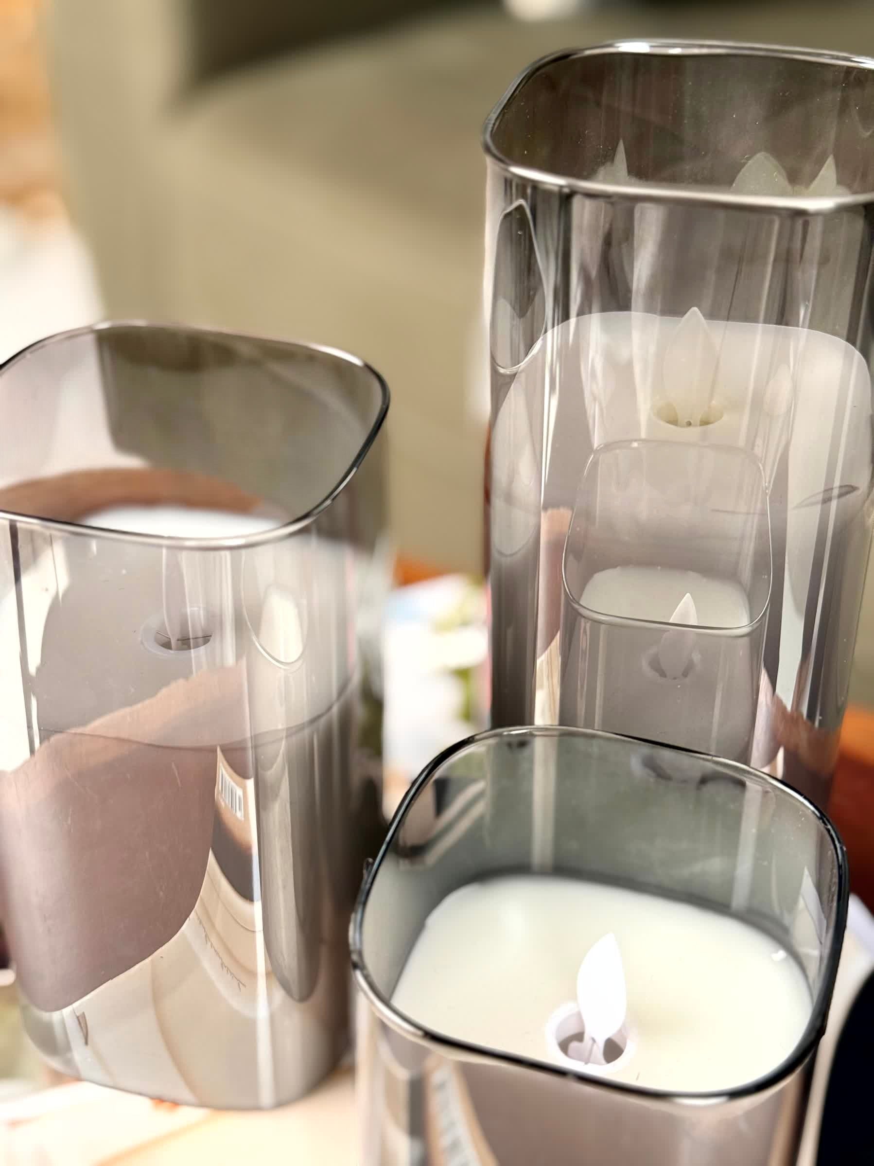 High Objects Halomist LED candles in tinted glass holders with flickering flames, set of 3.