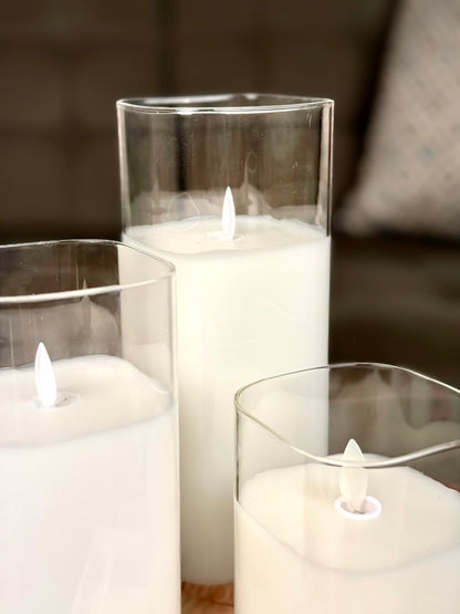 High Objects Halomist LED candles with white wax and clear glass cylinders, flickering LED flames.