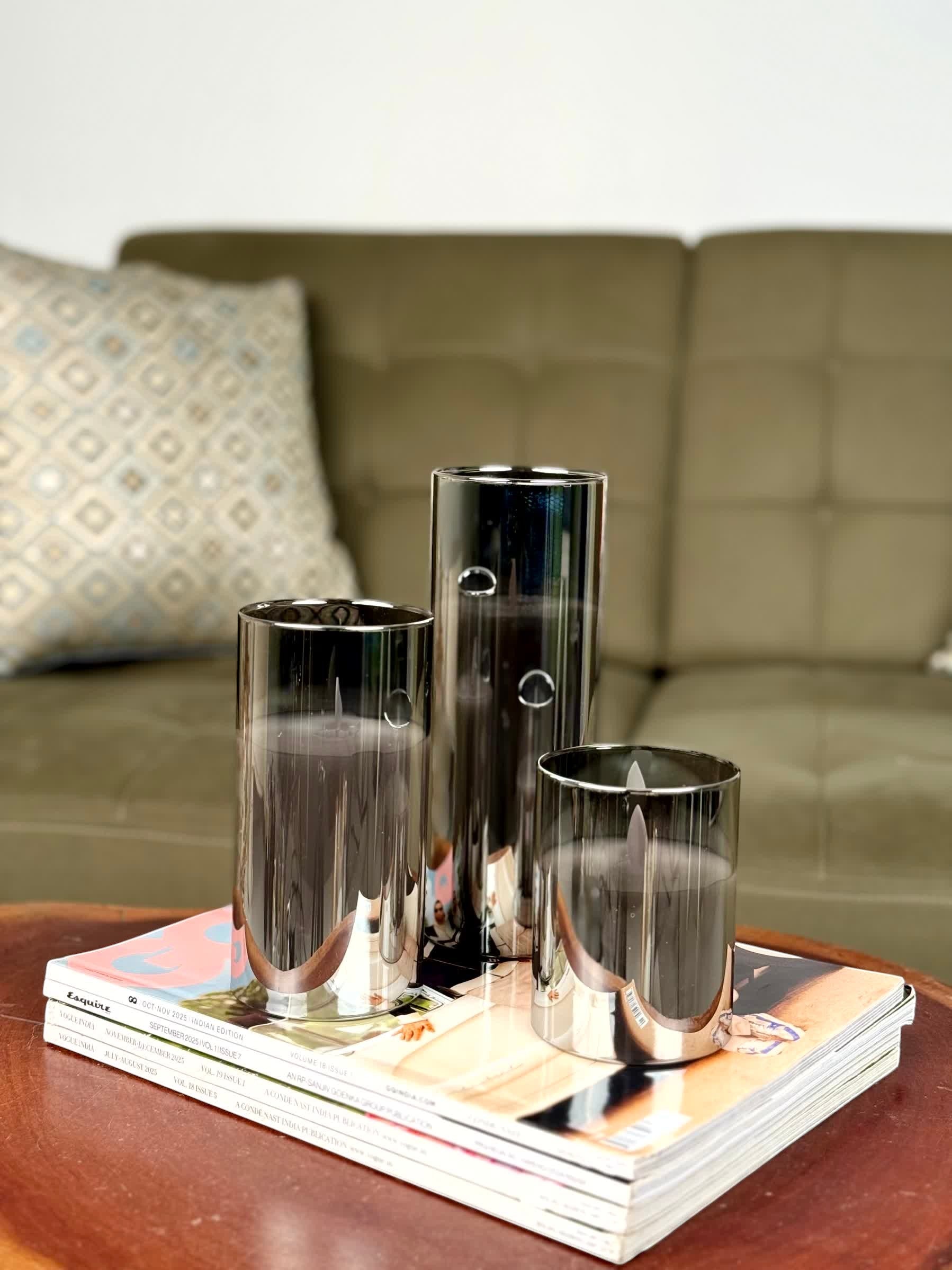 High Objects Lumiglass LED Candle Collection, set of 3 grey glass pillar candles with flickering LED flames.
