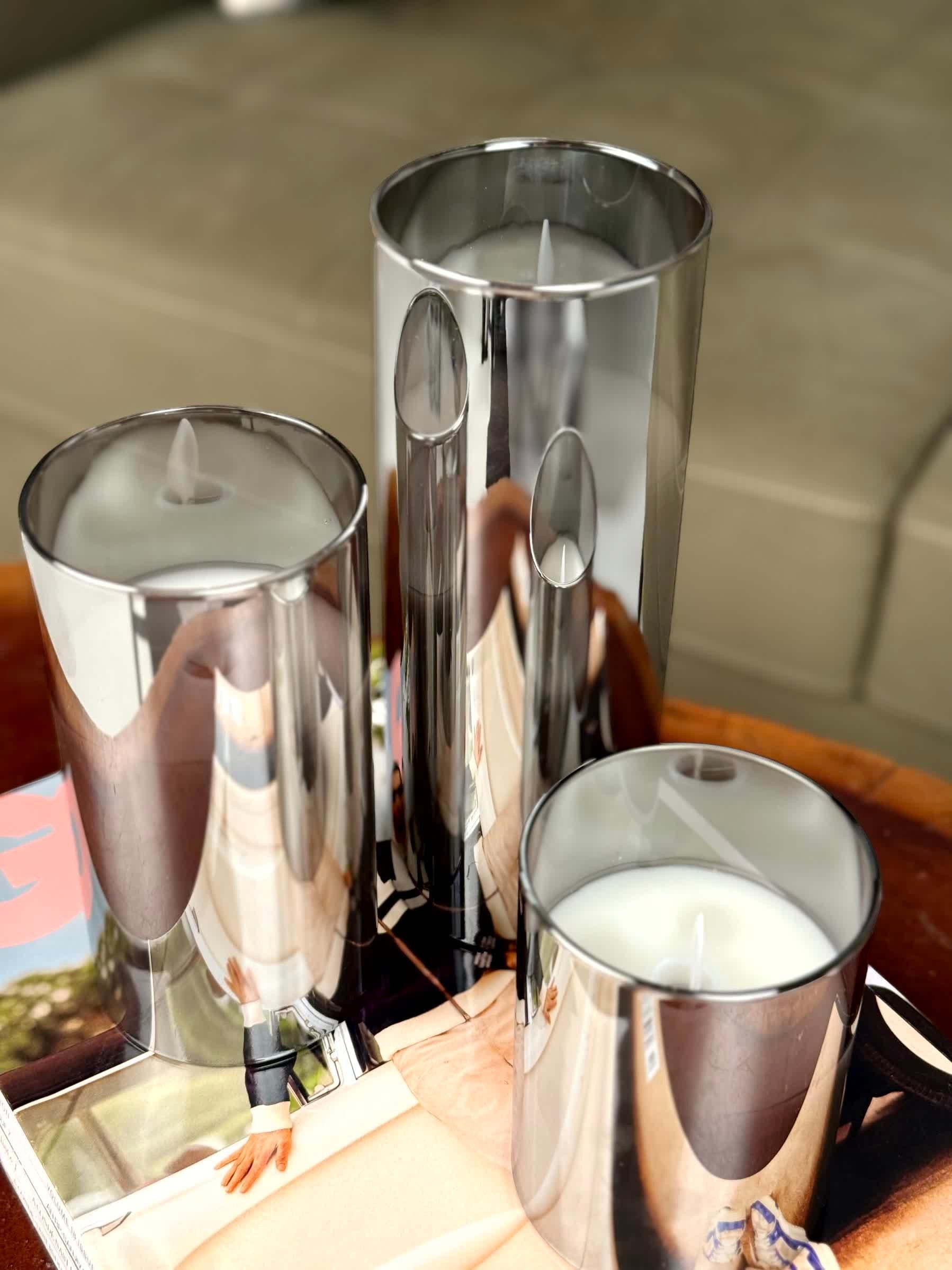 High Objects Lumiglass LED Candle Collection, set of 3 silver metallic pillar candles in glass cylinders, flameless.