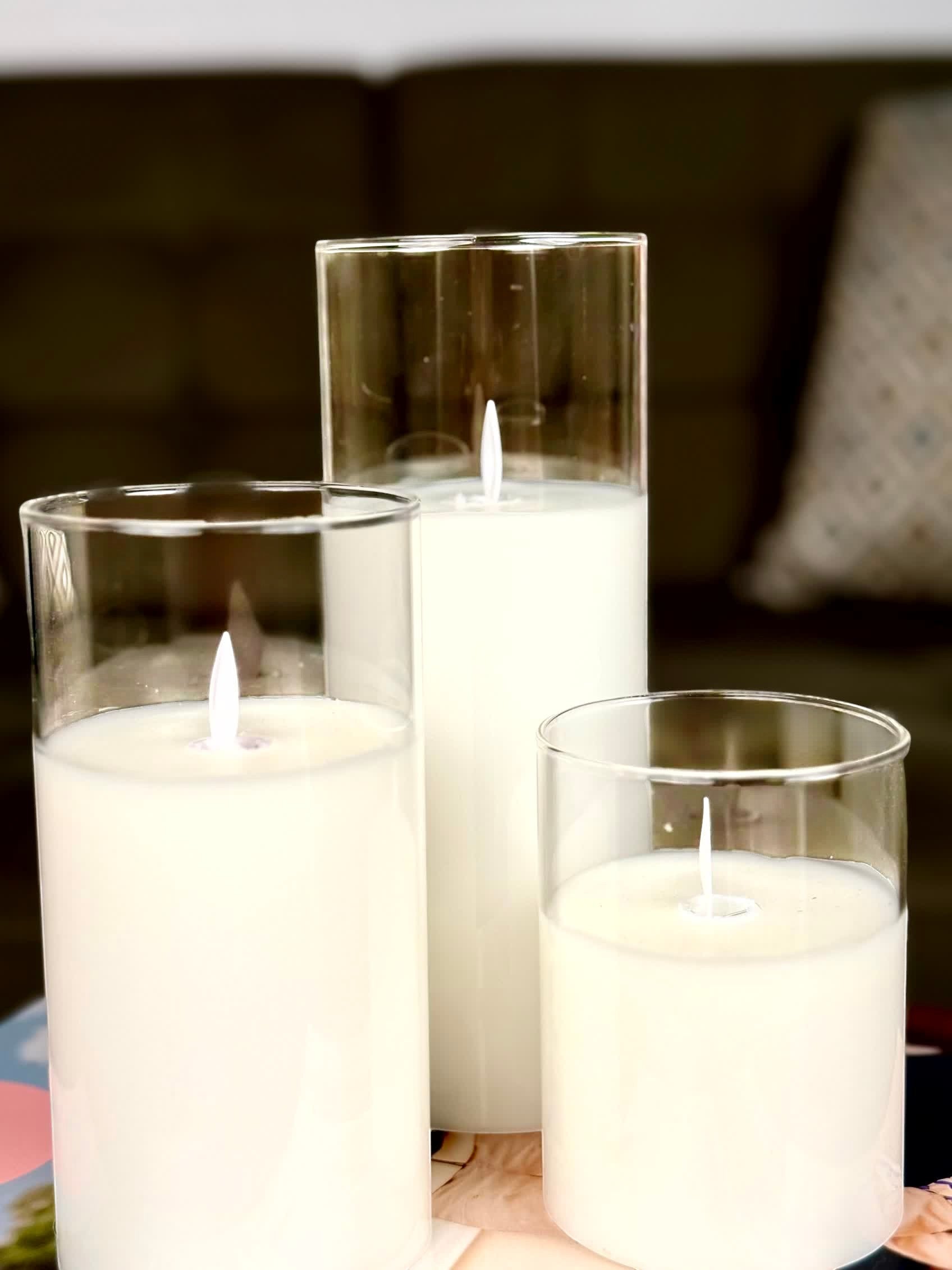 High Objects Lumiglass LED Candle Collection, set of 3 white pillar candles in clear glass cylinders, flickering LED flames.