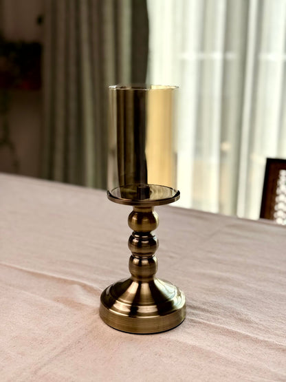 High Objects Luminaria Pedestal Candle Stand Set, antique brass metal base with stacked spheres, clear glass hurricane holder.