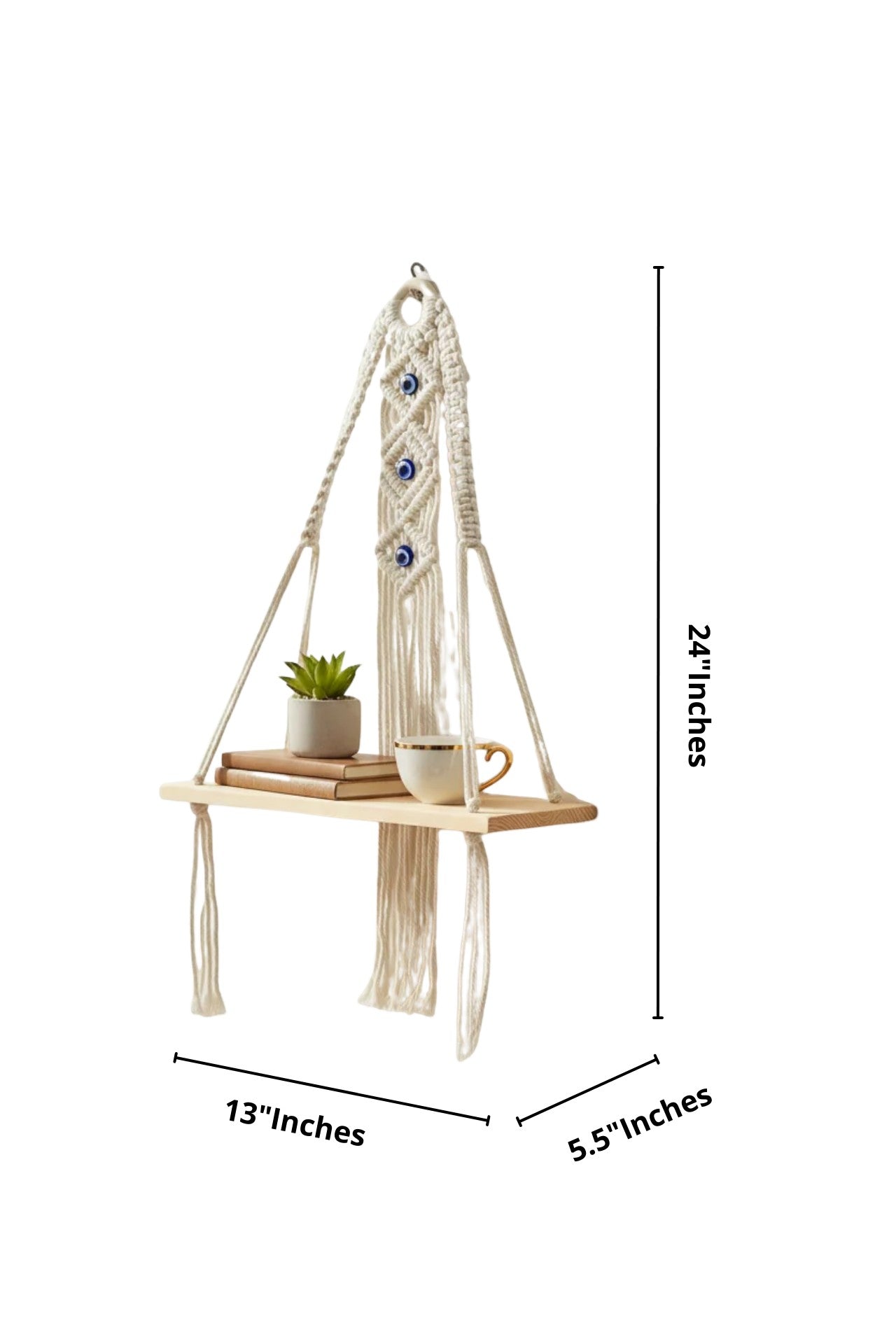 High Objects Zen Series handmade macramé shelf with natural wood, cream rope, and blue evil eye accents. Holds books, plant, and mug.