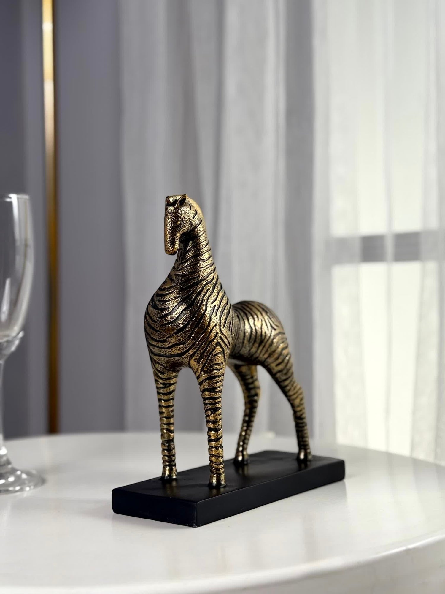 High Objects gold and black zebra-striped horse showpiece, 8-inch polyresin sculpture with bold silhouette.