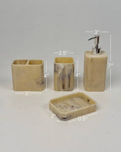 High Objects Marrow Stone Bathroom Accessory Set: soap dish, toothbrush holder, cup, and lotion dispenser in beige with marbled grey details.