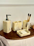 High Objects Marrow Stone Bathroom Accessory Set with soap dispenser, toothbrush holder, and soap dish in marbled cream and grey.