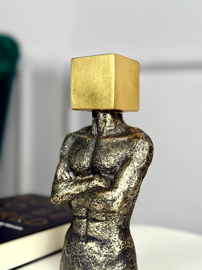 High Objects Mind in Form Showpiece sculpture, textured polyresin torso with crossed arms, gold cube head. Modern decor.