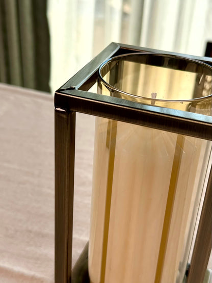 High Objects Modern Halo Frame Candle Stand Set, metal frame with glass cylinder holding a white pillar candle.