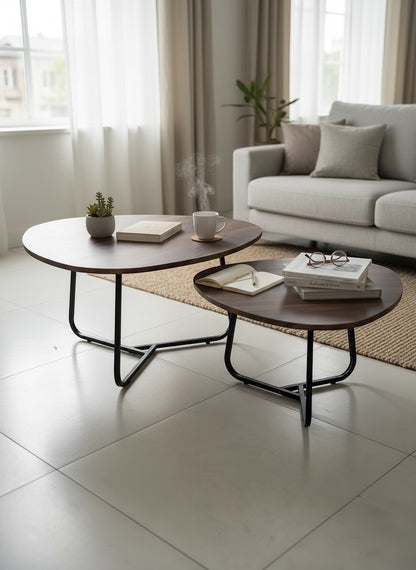 High Objects modern round nesting coffee tables with dark wood tops and black metal bases. Set of 2.