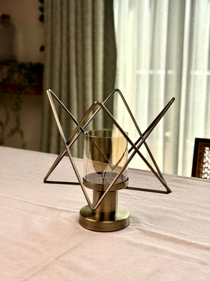 High Objects Nexus Geo Candle Stand with metallic pedestal and geometric wire frame. Bronze finish.