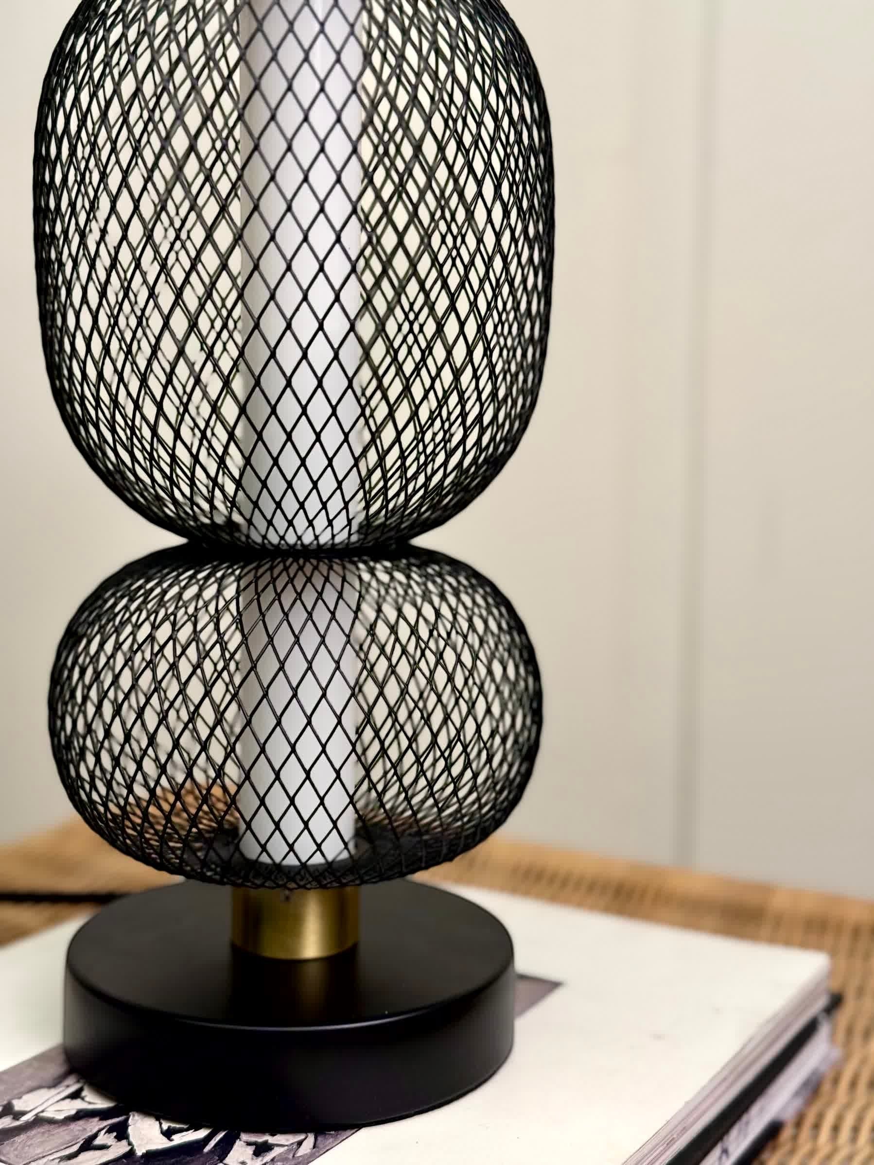 High Objects Nova Mesh Duo Table Lamp with black mesh double sphere shade and brushed gold accents.