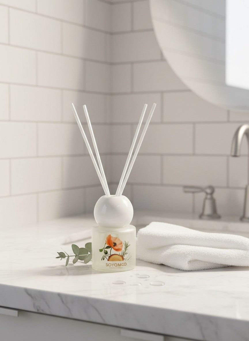 High Objects frosted glass reed diffuser with floral artwork and Ocean scent. Includes white reeds.