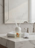 High Objects elegant frosted glass reed diffuser with floral artwork and ocean scent, 50ML.