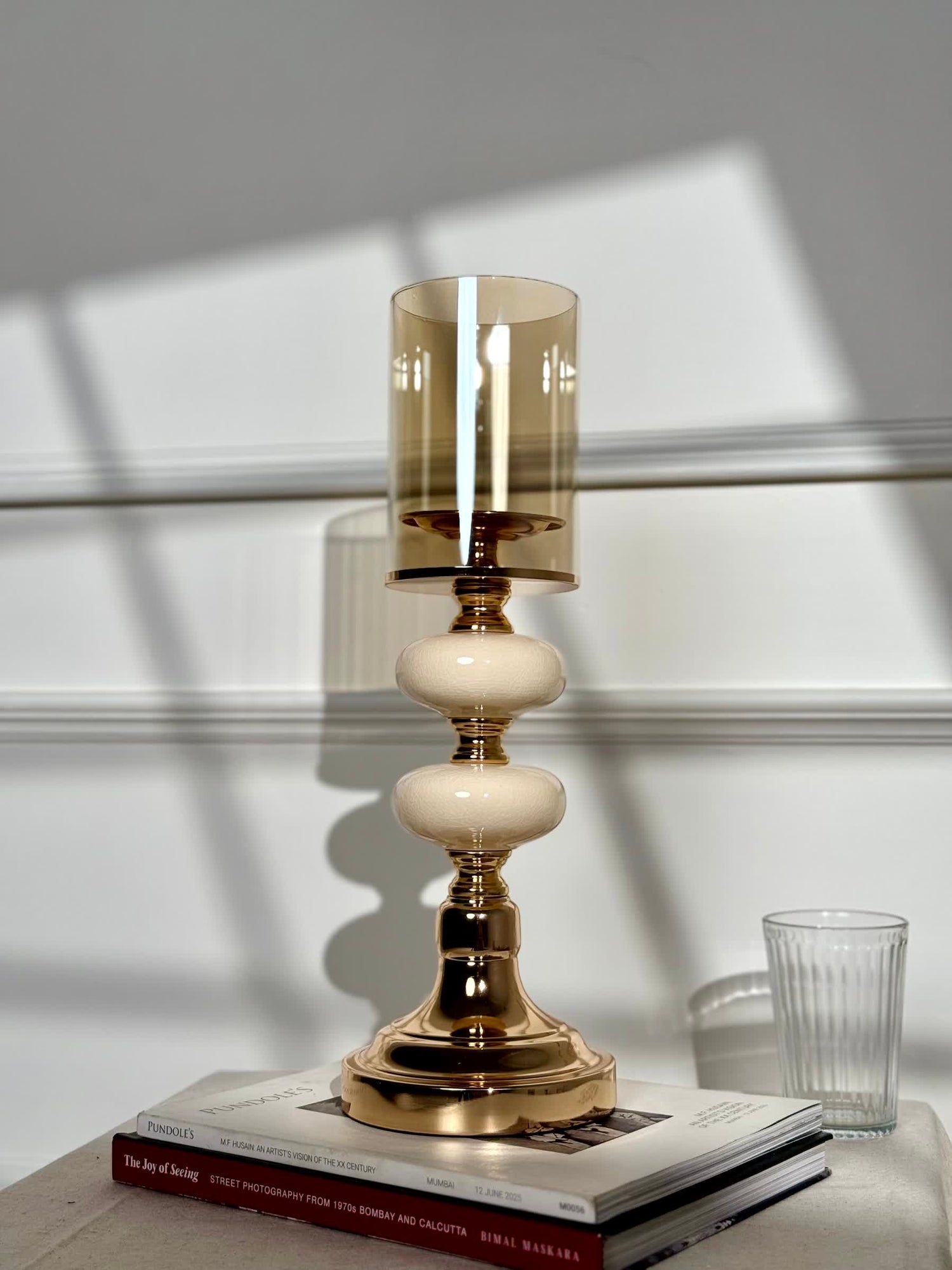 High Objects Opaline Gold Candle Stand Collection with amber glass shade and opaline accents. Decorative accent.