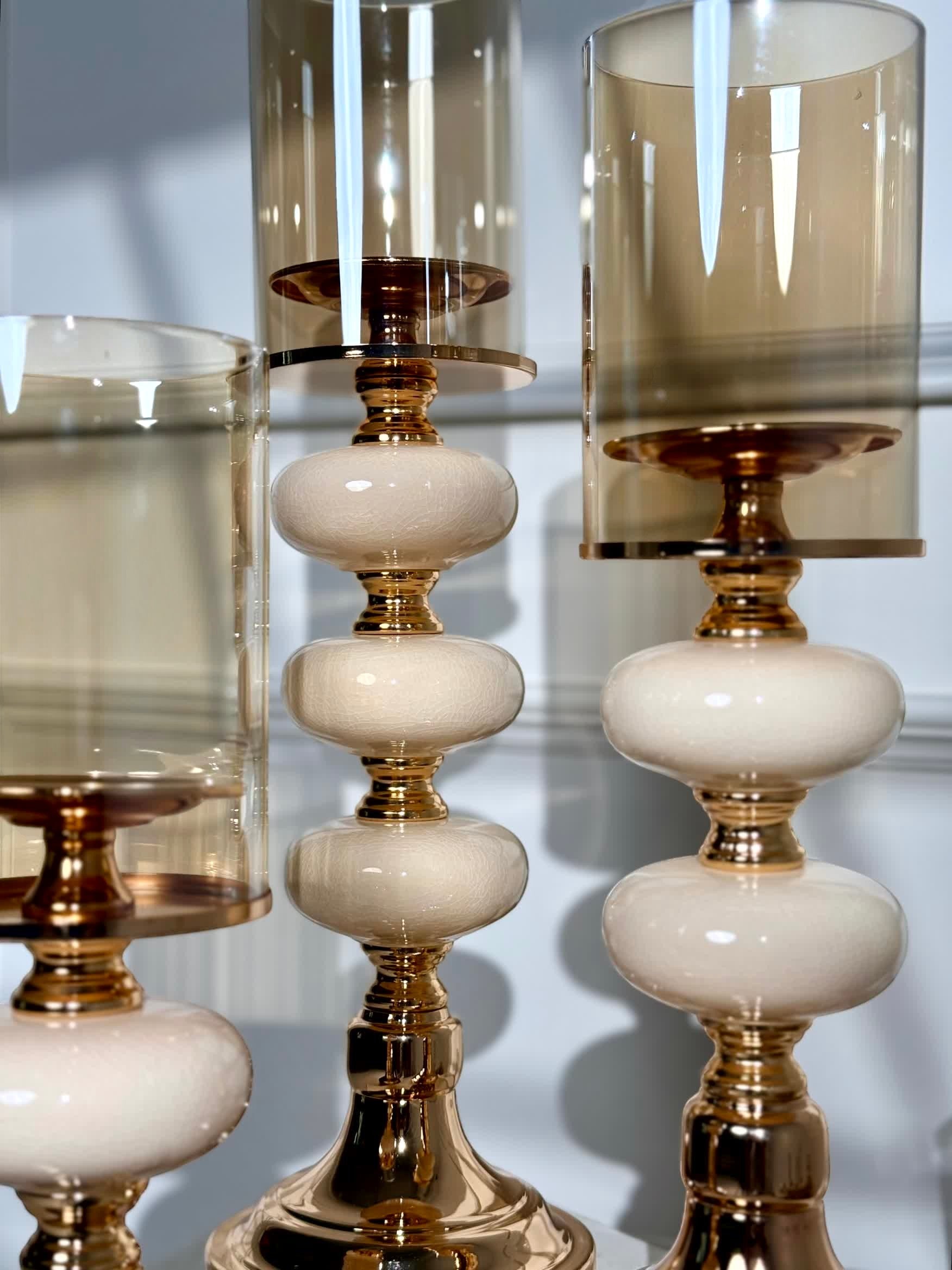 High Objects Opaline Gold Candle Stand Collection: Set of 3 gold candle holders with opaline accents and amber glass shades.