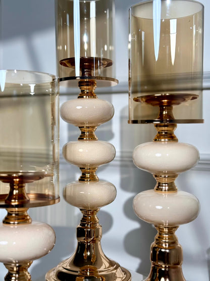 High Objects Opaline Gold Candle Stand Collection: Set of 3 gold candle holders with opaline accents and amber glass shades.