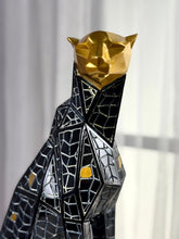 High Objects abstract panther showpiece with gold geometric head and black mosaic body, symbolizing strength.