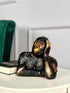 High Objects Pensive Gorilla showpiece sculpture with a golden face and black textured body, resting head on hand.