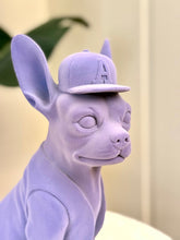 High Objects Pup City Showpiece, a matte lavender French bulldog sculpture wearing a baseball cap with an A logo.