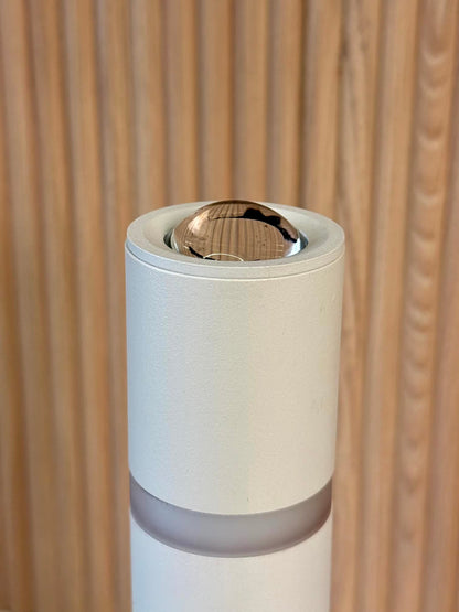 High Objects Pureline Column Table Lamp, white cylindrical lamp with a frosted band and reflective top detail.