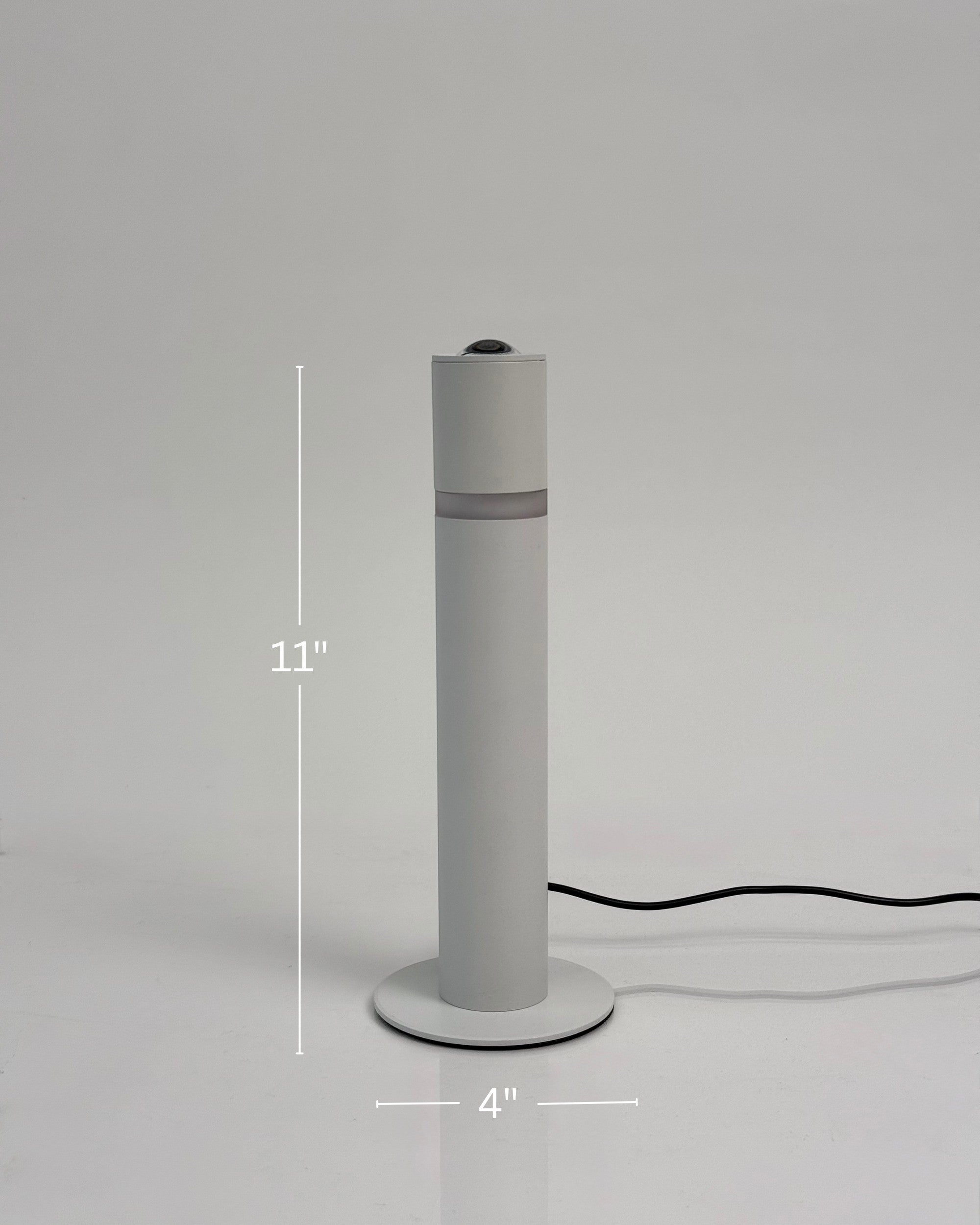 High Objects Pureline white cylindrical table lamp with a subtle mid-band detail, 11" tall.