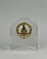 High Objects Regal Crystal Desk Clock with exposed gears and gold Roman numerals. Arched silhouette, clear polished crystal.