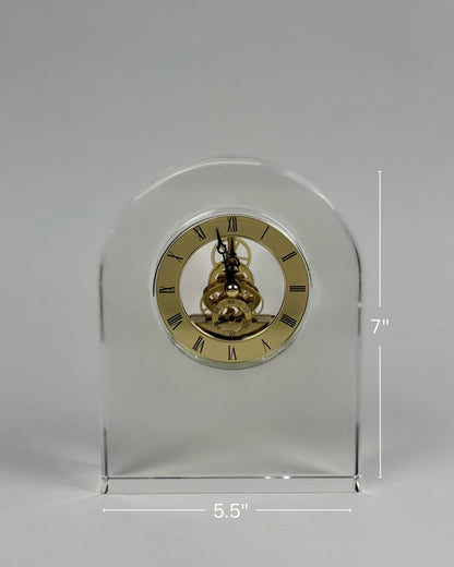 High Objects Regal Crystal Desk Clock with exposed gears and gold Roman numerals. Arched silhouette, clear polished crystal.
