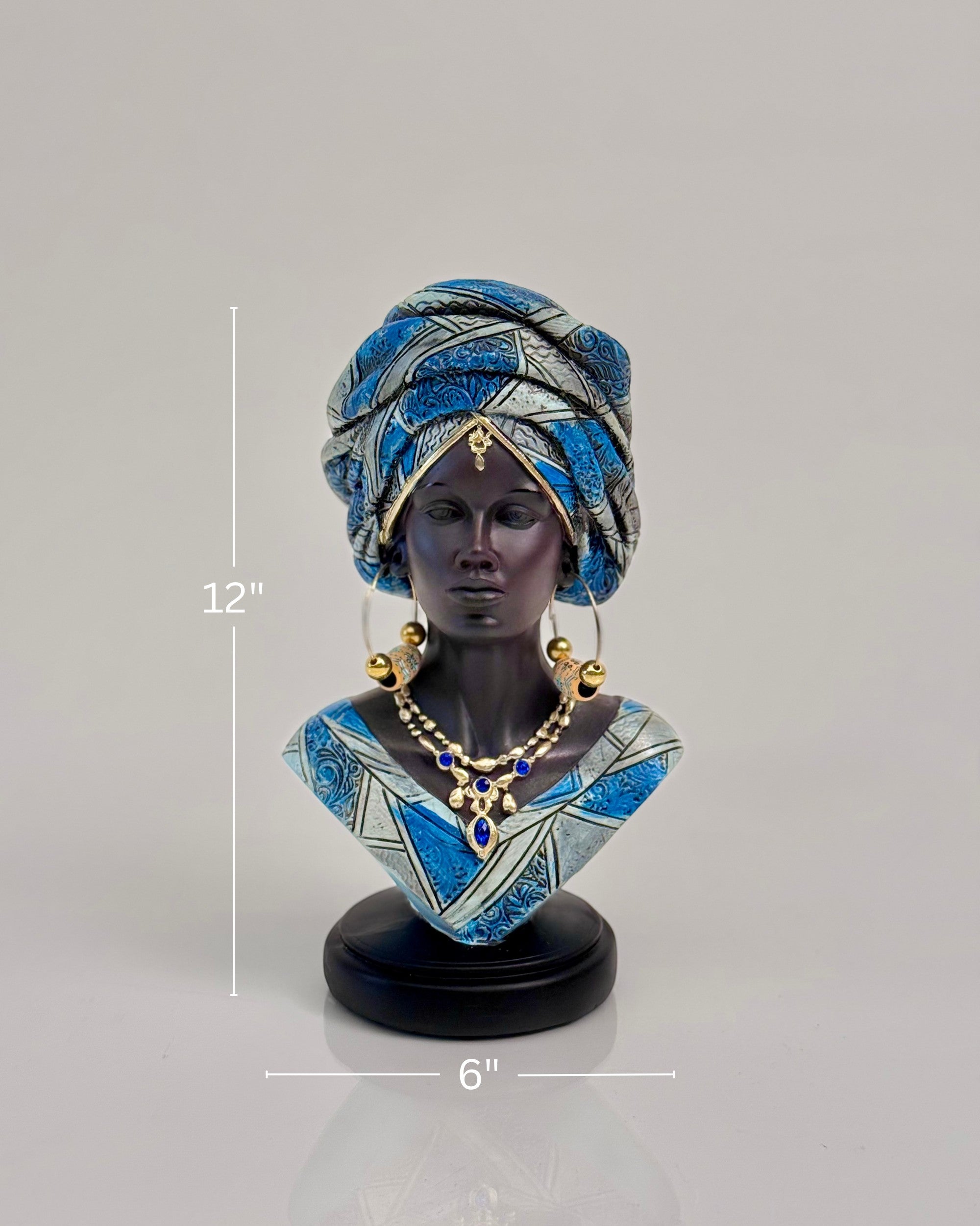 High Objects Regal Essence Woman Showpiece bust with blue and silver headwrap and matching attire, gold jewelry with blue gems.