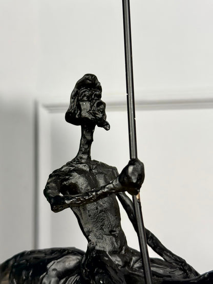 High Objects abstract black-bronze rider sculpture with spear, 17" H x 16" W, textured finish.