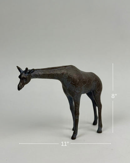 High Objects Savannah Grace polyresin giraffe showpiece, 8" tall, 11" wide, neutral tone with textured spots.