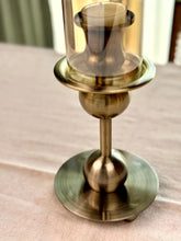 High Objects Seren Column Candle Stand Set, antique brass metal with sphere detail and tinted glass hurricane cover.