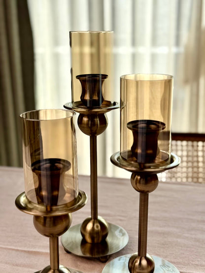 High Objects Seren Column Candle Stand Set, metallic, amber glass hurricane, sphere detail, set of 3