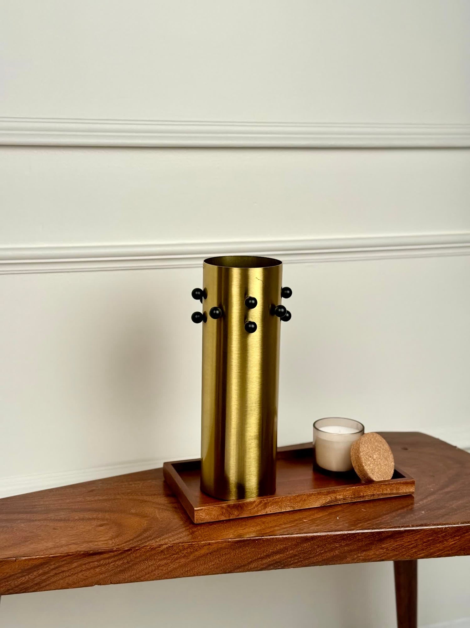 High Objects Studform Metal Vase, brushed brass cylinder with black studs, modern sculptural decor.