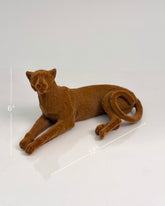 High Objects terracotta cheetah sculpture with carved detailing, lying down. 12" L x 6" H.