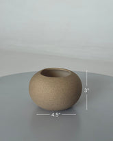 High Objects TerraSphere spherical ceramic vase in natural earthy tone with textured finish. Measures 4.5" W x 3" H.