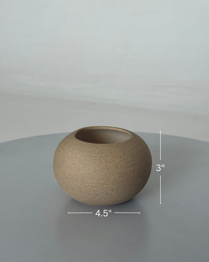 High Objects TerraSphere spherical ceramic vase in natural earthy tone with textured finish. Measures 4.5" W x 3" H.