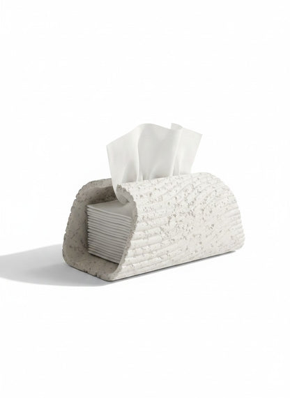 High Objects textured cream tissue box holder with white tissues, on a wooden desk.