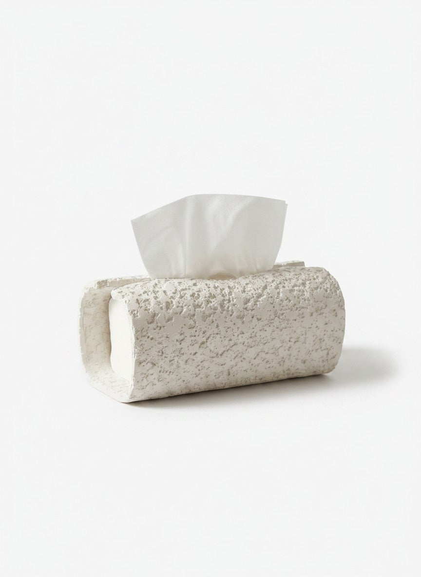 High Objects textured white rectangular tissue box holder on a marble countertop with soap and a towel.