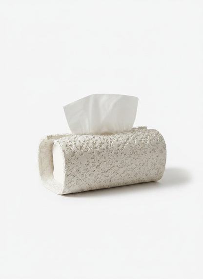 High Objects textured white rectangular tissue box holder on a marble countertop with soap and a towel.