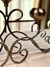 High Objects Valencia Scroll Five-Arm Candle Stand in antique bronze with ornate scrollwork and glass candle holders.