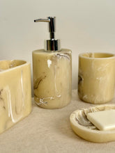 High Objects Veinstone Bathroom Accessory Set: soap dispenser, cup, and soap dish in beige with brown veining.