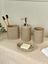 High Objects Weaveform Bathroom Accessory Set: soap dispenser, toothbrush holder, cup, and soap dish in beige woven texture.