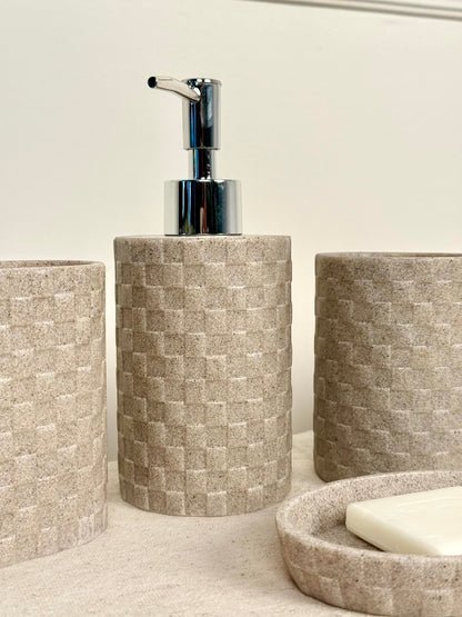 High Objects Weaveform bathroom accessory set in beige with woven texture. Includes soap dispenser, cup, and soap dish.