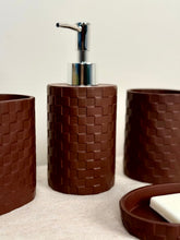 High Objects Weaveform bathroom accessory set in dark brown, featuring a woven texture. Includes soap dispenser, cups, and soap dish.