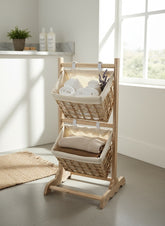 High Objects wooden 2-tier basket storage organizer with woven baskets holding towels and sweaters.