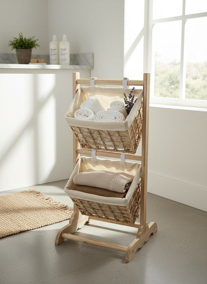 High Objects wooden 2-tier basket storage organizer with woven baskets holding towels and sweaters.