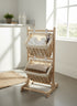 High Objects wooden 2-tier basket storage organizer with woven baskets holding towels and sweaters.